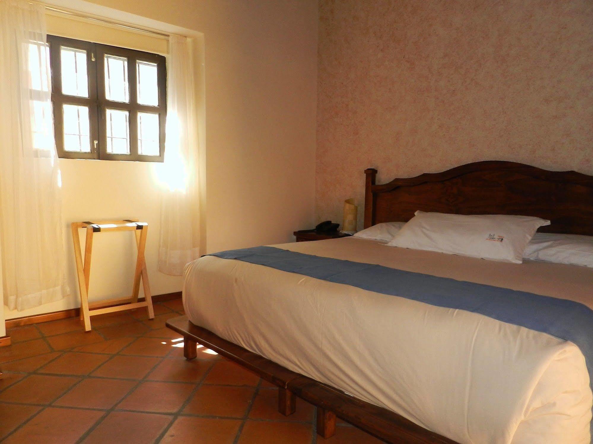 Hotel Collection O Al otro lado del rio, Heroica Puebla de Zaragoza Exterior foto A room at Hotel San Cristóbal